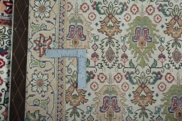 Close-up detail of 2000s Tabriz rug from Iran / Persia showing Wool weave