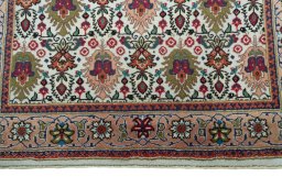 Central medallion detail of 2000s Tabriz rug from Iran / Persia