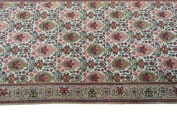 Close-up detail of 2000s Tabriz rug from Iran / Persia showing Wool weave