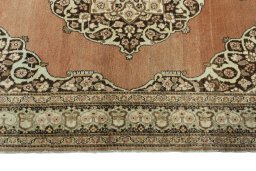 Corner detail of 1930s Tabriz rug showing border pattern and Wool pile