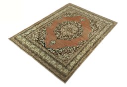 Corner detail of 1930s Tabriz rug showing border pattern and Wool pile