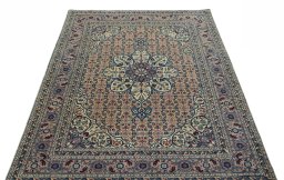 Surface texture of 1950s Tabriz rug with natural Wool and intricate pattern