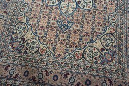 Close-up detail of 1950s Tabriz rug from Iran / Persia showing Wool weave