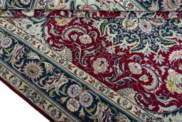 Close-up detail of 2000s Tabriz rug from Iran / Persia showing Wool weave