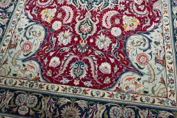 Close-up detail of 2000s Tabriz rug from Iran / Persia showing Wool weave