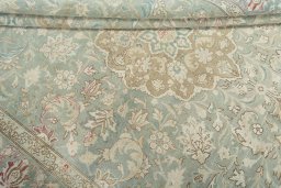 Close-up detail of 1950s Tabriz rug from Iran / Persia showing Wool weave