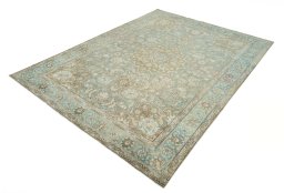Corner detail of 1950s Tabriz rug showing border pattern and Wool pile