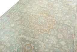 Backside of handmade 1950s Tabriz rug showing knot structure and weave density