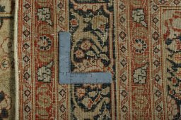 Backside of handmade 1930s Tabriz rug showing knot structure and weave density