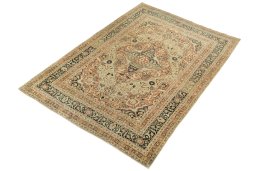 Corner detail of 1930s Tabriz rug showing border pattern and Wool pile