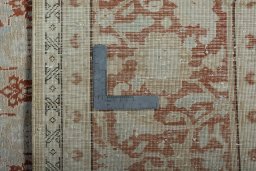 Surface texture of 2000s Tabriz rug with natural Wool and intricate pattern