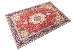 Close-up detail of 1980s Tabriz rug from Iran / Persia showing Wool weave