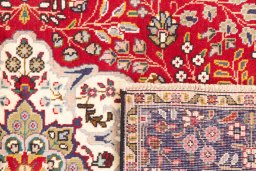 Close-up detail of 1980s Tabriz rug from Iran / Persia showing Wool weave