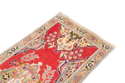 Surface texture of 2003s Tabriz rug with natural Wool and intricate pattern