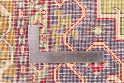 Corner detail of 1980s Tabriz rug showing border pattern and Wool pile