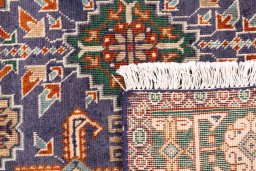 Close-up detail of 1970s Tabriz rug from Iran / Persia showing Wool weave