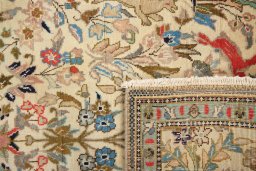 Close-up detail of 2000s Tabriz rug from Iran / Persia showing Wool weave