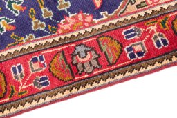 Backside of handmade 1996s Tabriz rug showing knot structure and weave density