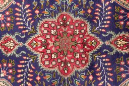 Full view of 1996s Tabriz rug from Iran / Persia, 138 × 95 cm in Dark blue tones