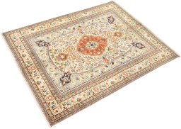 Corner detail of 1990s Tabriz rug showing border pattern and Wool pile