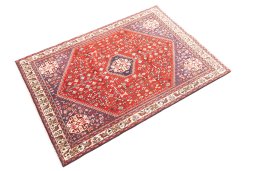 Corner detail of 1973s Tabriz rug showing border pattern and Wool pile
