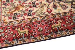 Backside of handmade 1980s Tabriz rug showing knot structure and weave density