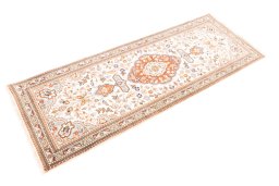 Corner detail of 2005s Tabriz rug showing border pattern and Wool pile