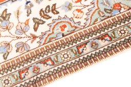 Backside of handmade 2005s Tabriz rug showing knot structure and weave density
