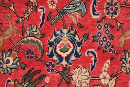 Corner detail of 2000s Tabriz rug showing border pattern and Wool pile