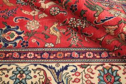 Surface texture of 2000s Tabriz rug with natural Wool and intricate pattern