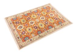 Corner detail of 1999s Tabriz rug showing border pattern and Wool pile