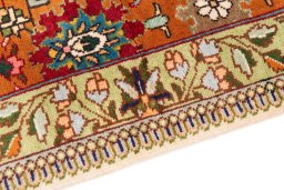 Backside of handmade 1999s Tabriz rug showing knot structure and weave density