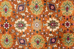 Close-up detail of 1999s Tabriz rug from Iran / Persia showing Wool weave