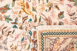 Close-up detail of 1975s Tabriz rug from Iran / Persia showing Wool weave