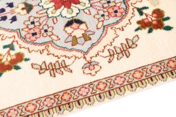 Backside of handmade 1985s Tabriz rug showing knot structure and weave density