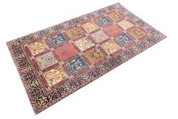Corner detail of 2005s Tabriz rug showing border pattern and Wool pile