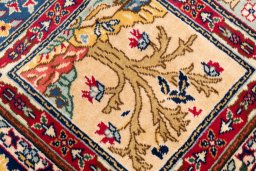 Close-up detail of 2005s Tabriz rug from Iran / Persia showing Wool weave