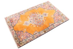 Corner detail of 2004s Tabriz rug showing border pattern and Wool pile