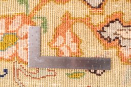 Close-up detail of 1978s Tabriz rug from Iran / Persia showing Wool weave