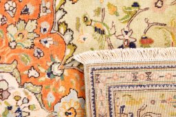 Close-up detail of 1978s Tabriz rug from Iran / Persia showing Wool weave
