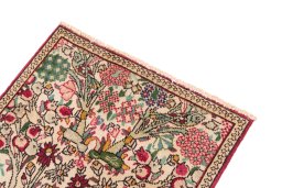 Surface texture of 2000s Tabriz rug with natural Wool and intricate pattern