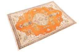 Corner detail of 2006s Tabriz rug showing border pattern and Wool pile
