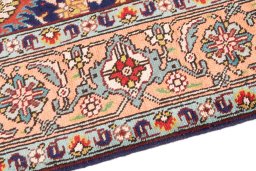 Backside of handmade 1985s Tabriz rug showing knot structure and weave density