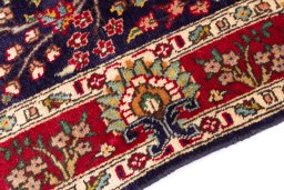 Backside of handmade 2006s Tabriz rug showing knot structure and weave density