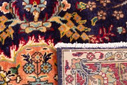 Close-up detail of 2006s Tabriz rug from Iran / Persia showing Wool weave