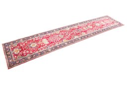 Corner detail of 2002s Tabriz rug showing border pattern and Wool pile