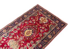 Surface texture of 2002s Tabriz rug with natural Wool and intricate pattern
