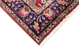 Central medallion detail of 2002s Tabriz rug from Iran / Persia