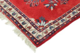 Backside of handmade 1990s Tabriz rug showing knot structure and weave density