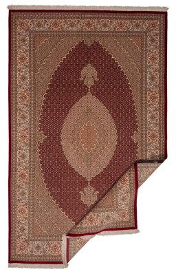 Central medallion detail of New Tabriz rug from Iran / Persia